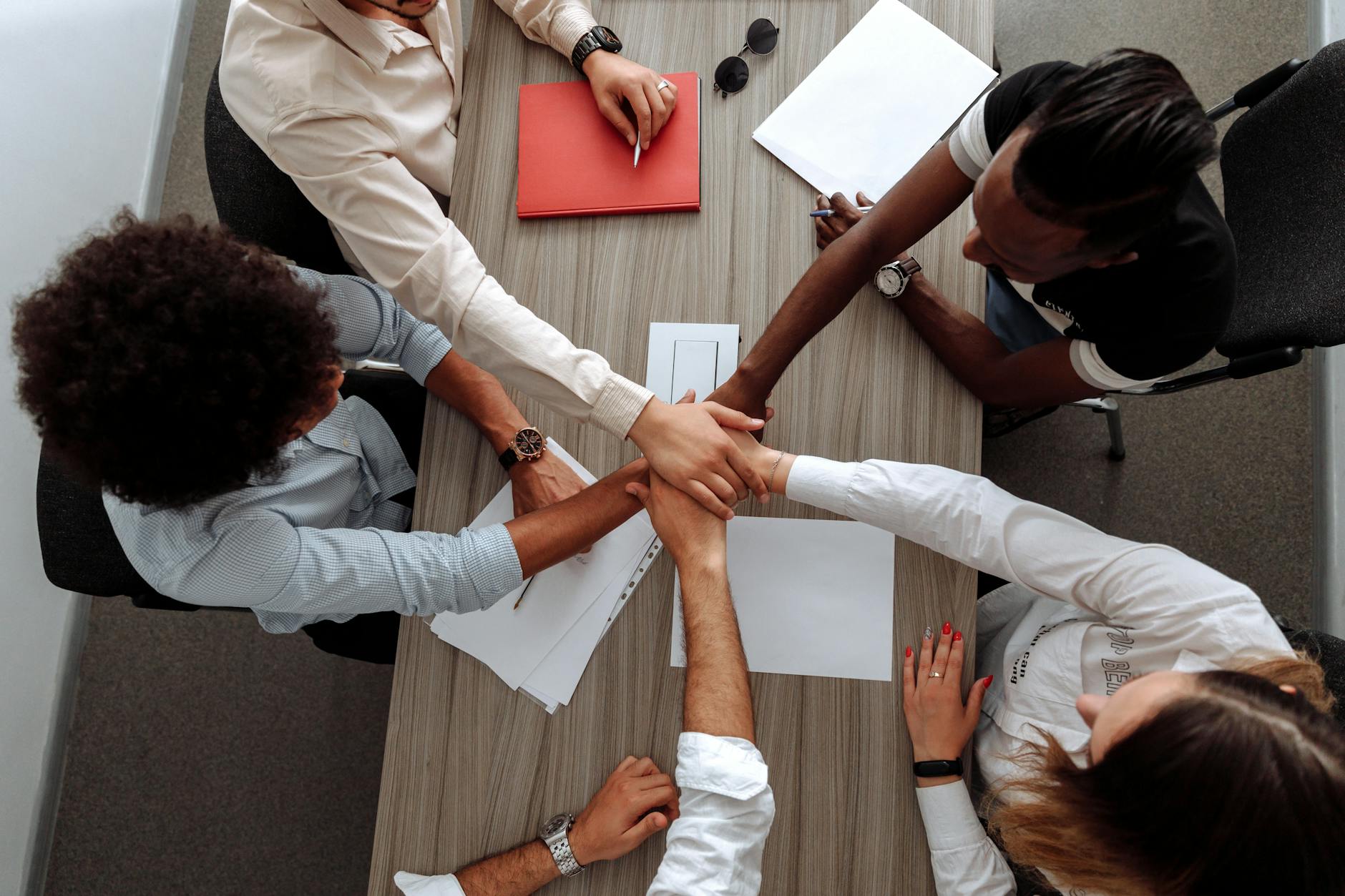 A team collaborating around a whiteboard on a security architecture